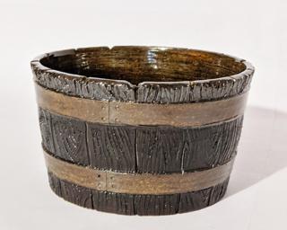 Adorn your home with this rustic glazed planter.