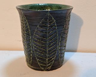 Add to your cup collection with this hand carved tumbler.