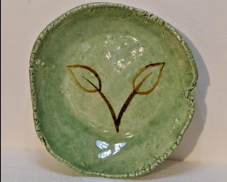 A lovely green dish for your dresser.