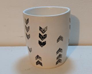 Add to your cup collection with this little stamped ceramic tumbler.