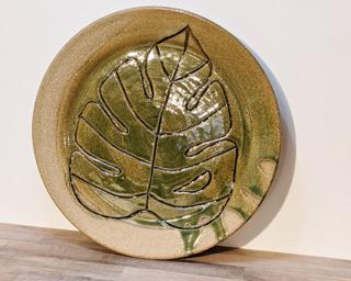A sweet little leaf dish for your dresser or table.