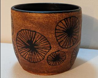 Adorn your home with this one of a kind painted planter.