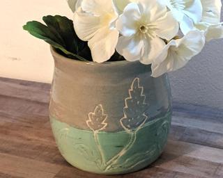 Adorn your home with this one of a kind colored vase.