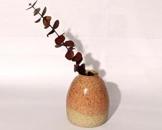 Adorn your home with this one of a kind specked vase.