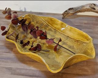 A delicate patterned dish for your dresser.