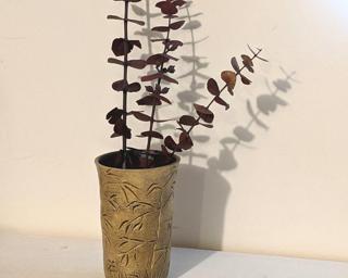 Adorn your home with this one of a kind carved bamboo tumbler/cup.