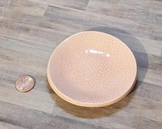 A sweet little dish for your dresser.
