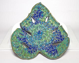 A sweet little leaf dish for your dresser.