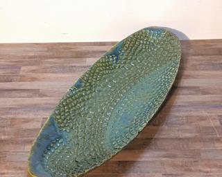 This long textured lace dish would look lovely on anyone's table.