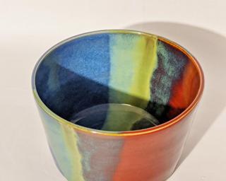 A fun and colorful planter for your window sill.