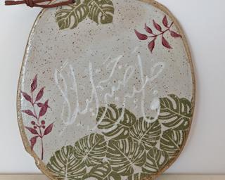 Use this handmade ceramic cheese and cracker board at your next gathering and its sure to be a hit.