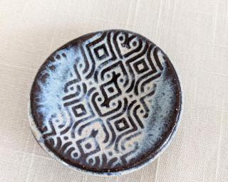 A sweet little dish for your dresser.