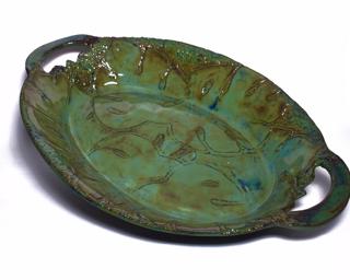 This large serving platter would look lovely on anyone's table. Small crack on rim