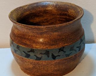 Adorn your home with this one of a kind stamped ginkgo leaf ceramic planter.