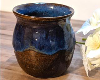 Adorn your home with this one of a kind little drippy vase.