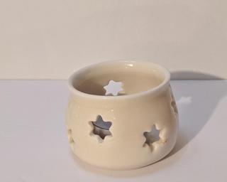 A lovely little summer candle holder for your table. Small cracks at the bottom but still completely functional.