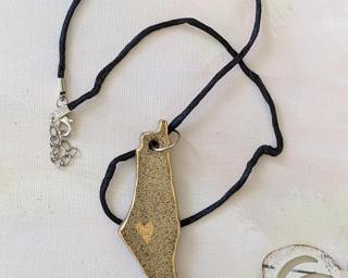 Show your support for Palestine with this handmade necklace.