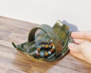 A sweet little basket-like dish for your dresser or table.