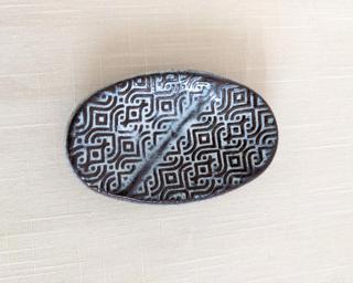 A sweet little dish for your dresser.
