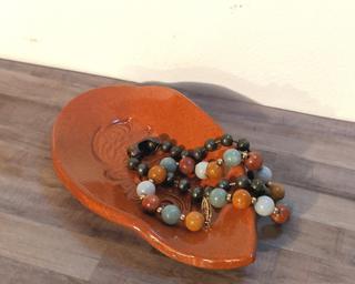 A sweet little dish for your dresser.