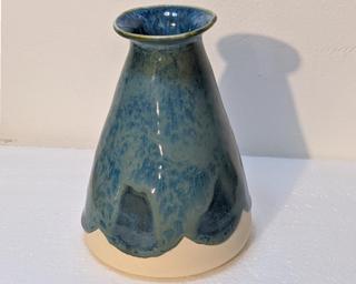 A sweet little vase for your shelf.