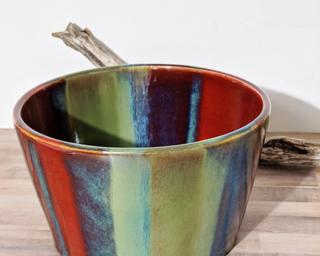 A fun and colorful planter for your window sill.