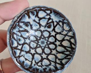 A sweet little dish for your dresser.