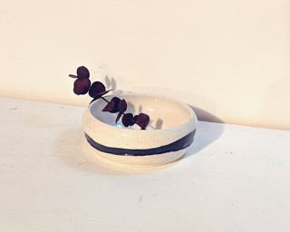 Adorn your home with this one of a kind ombre blue glazed planter.