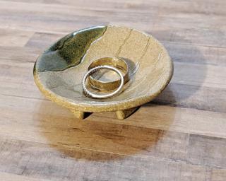 A sweet little footed dish for your dresser.