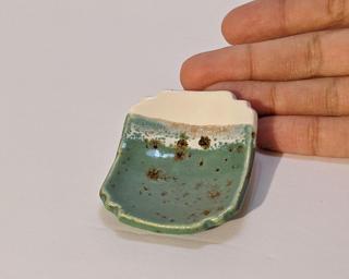 A sweet little speckled dish for your dresser.