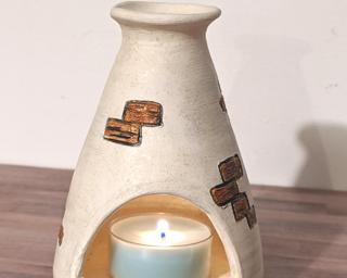 A lovely little candle holder for your table.