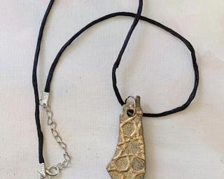 Show your support for Palestine with this handmade necklace.
