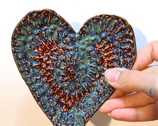 A sweet little textured heart dish for your dresser.