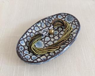 A sweet little dish for your dresser.