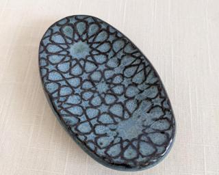 A sweet little dish for your dresser.