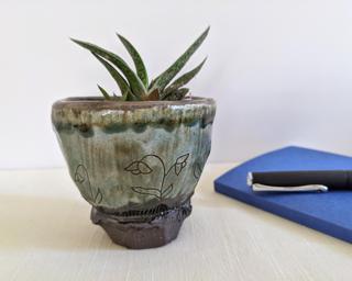 A sweet little planter for your shelf.