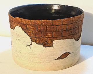 Adorn your home with this one of a kind carved planter.