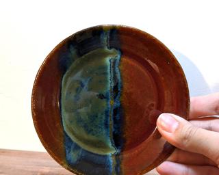 A lovely multicolored dish for your dresser.