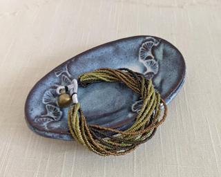 A sweet little dish for your dresser.