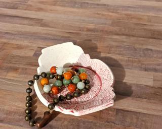 A sweet little jewelry dish for your dresser.