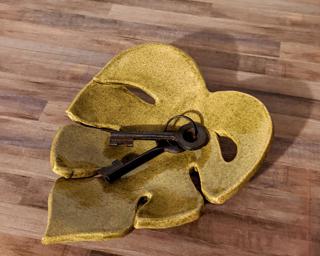 This lovely olive green monstera leaf dish would make such a sweet addition to your table or counter.