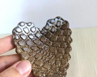 A sweet little textured heart dish for your dresser.