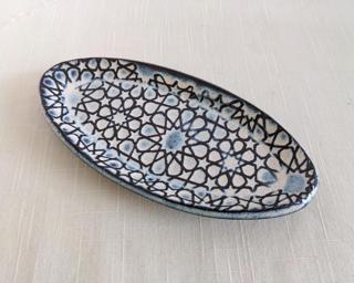 A sweet little dish for your dresser.