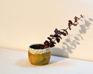 Adorn your home with this one of a kind glazed planter.
