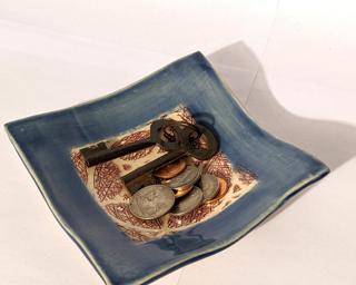 A unique little dish for your dresser.
