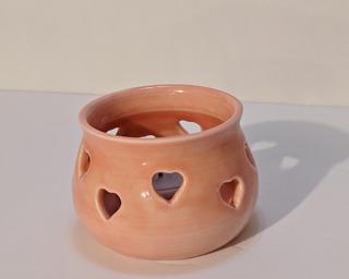 A lovely little summer candle holder for your table. Small cracks at the bottom but still completely functional.