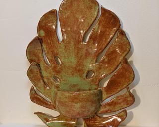A stunning monstera leaf-shaped planter for your wall. Small crack on the right side