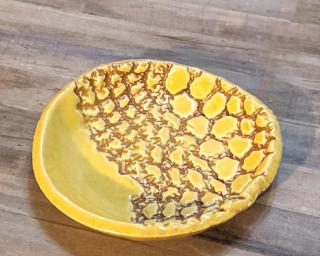 A sweet little textured dish for your dresser.