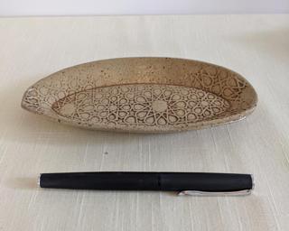 A sweet little dish for your dresser.