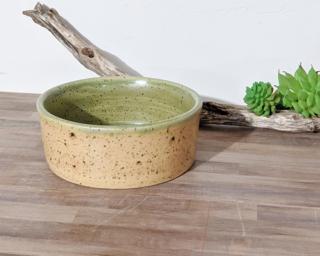 A nice little planter for your table. Cosmetic crack at bottom